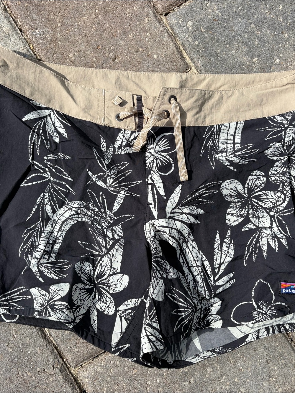 Patagonia women’s Black Floral Swim Shorts with Tan Waistband